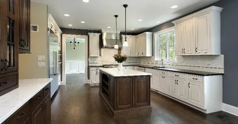 A Kitchen of White and Brown colour