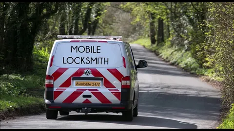 A locksmith car on a road